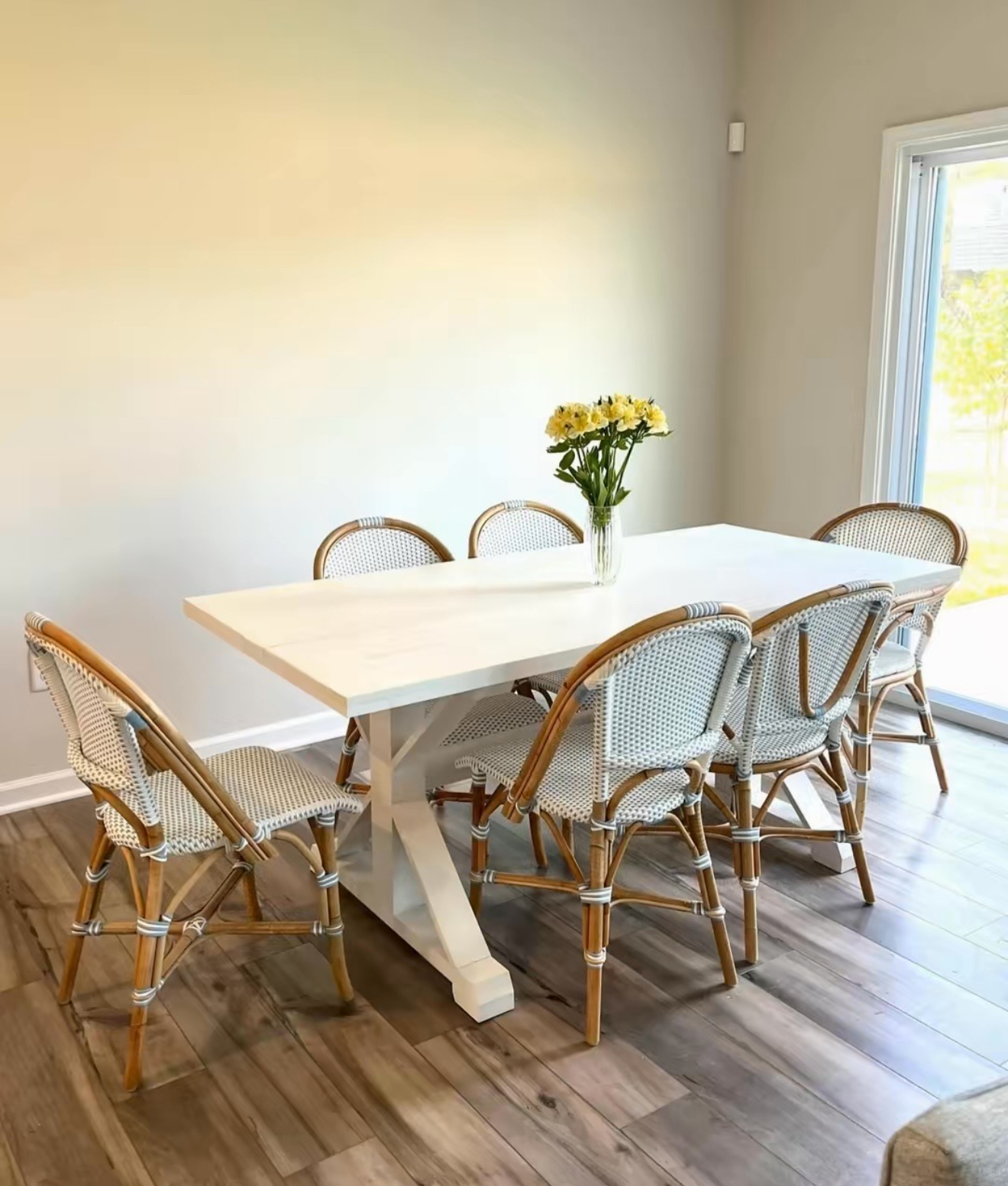 Custom white dining table in a customer’s home