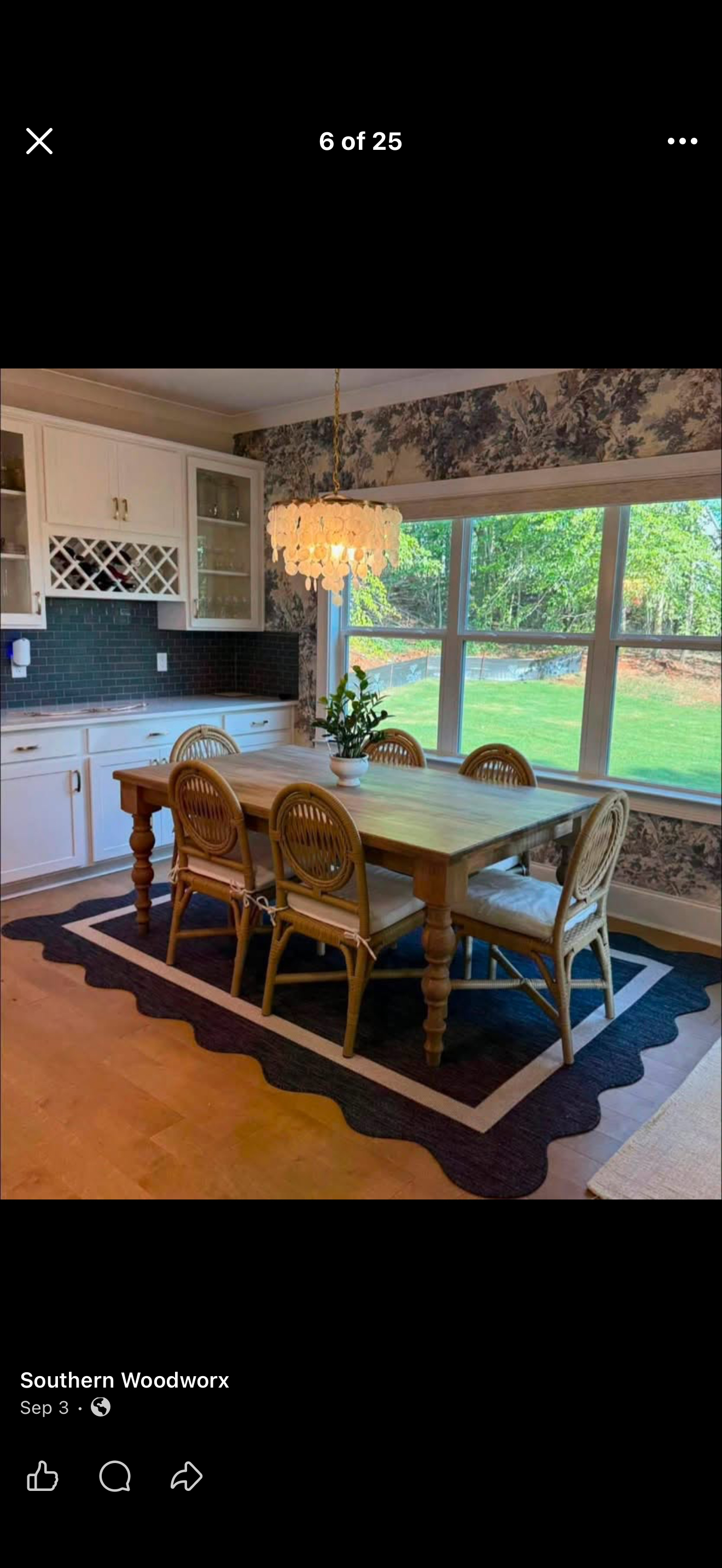 Warm wood dining table with turned legs, photographed in a home